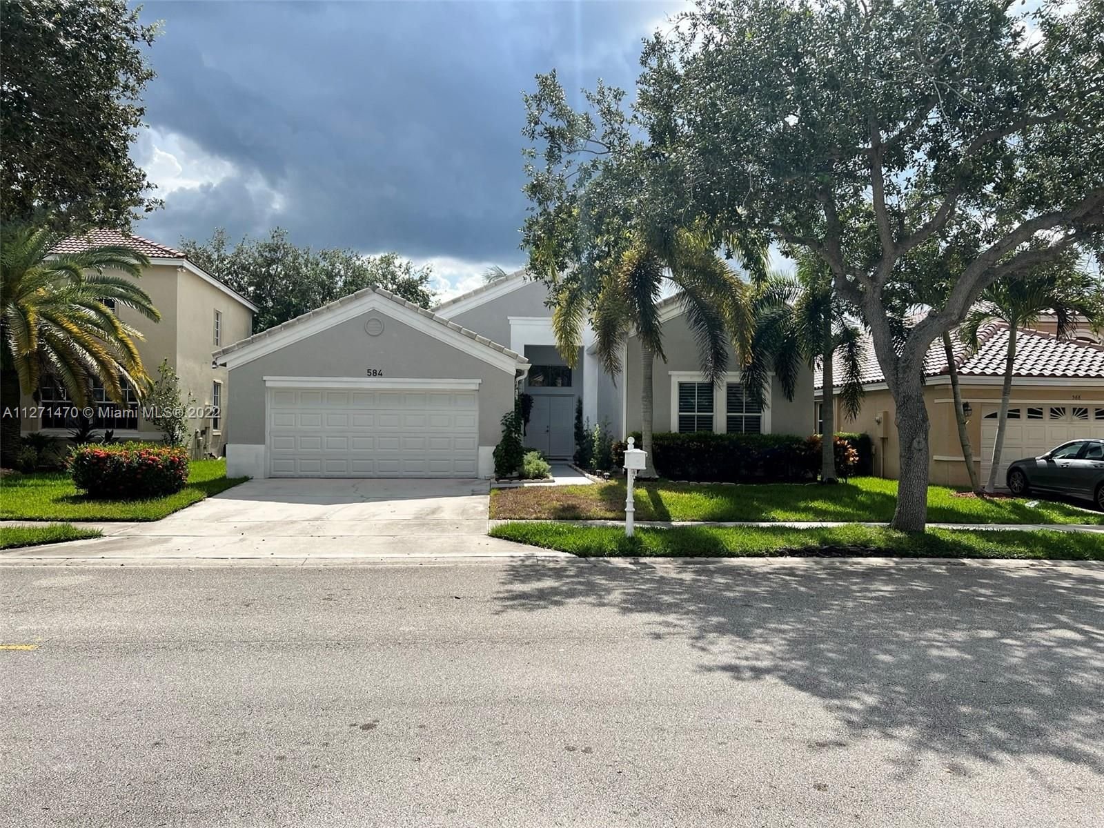 Real estate property located at 584 Cascade Falls Dr, Broward County, Weston, FL