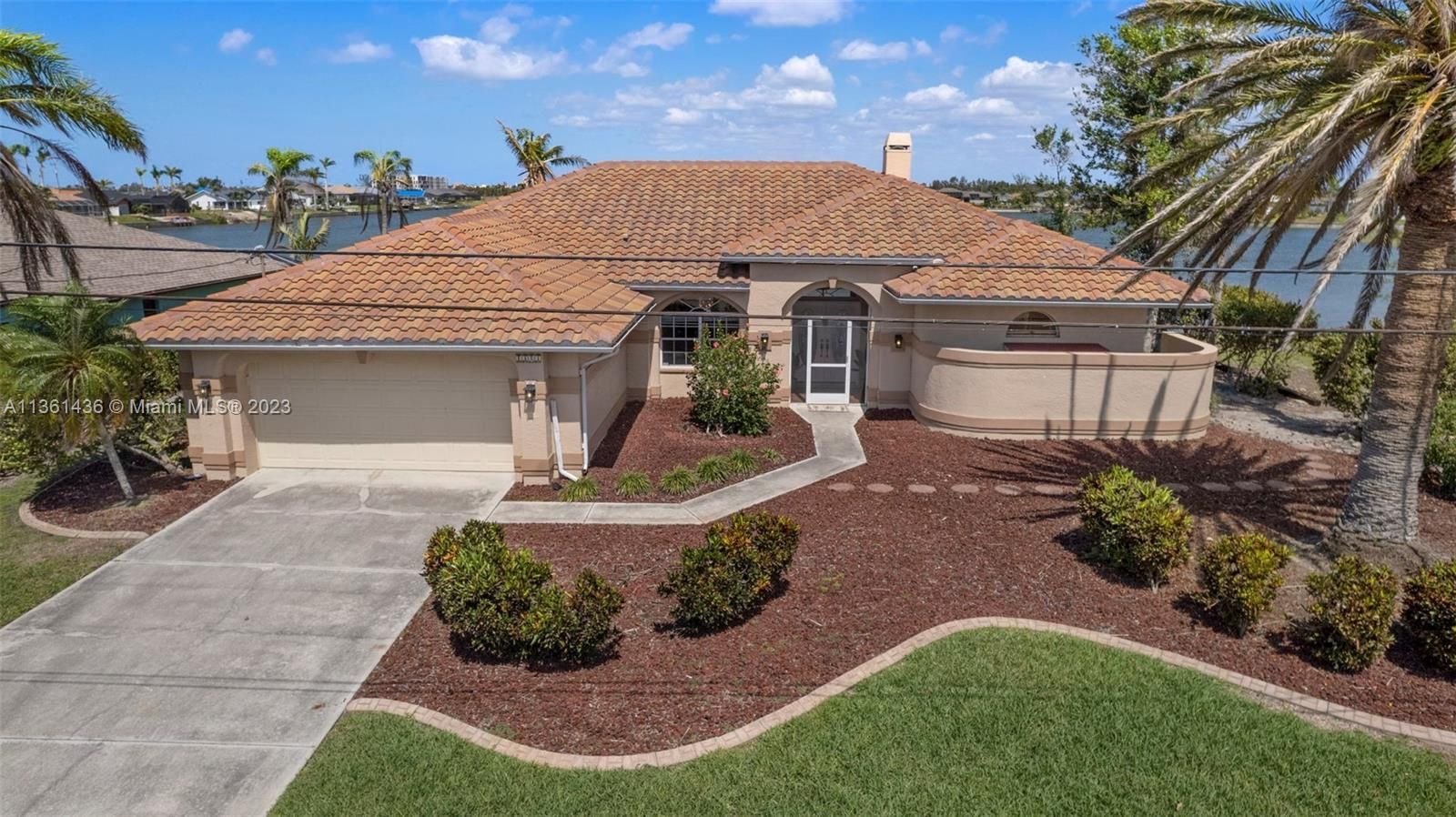 Real estate property located at 1323 27th Ter, Lee County, Cape Coral, FL
