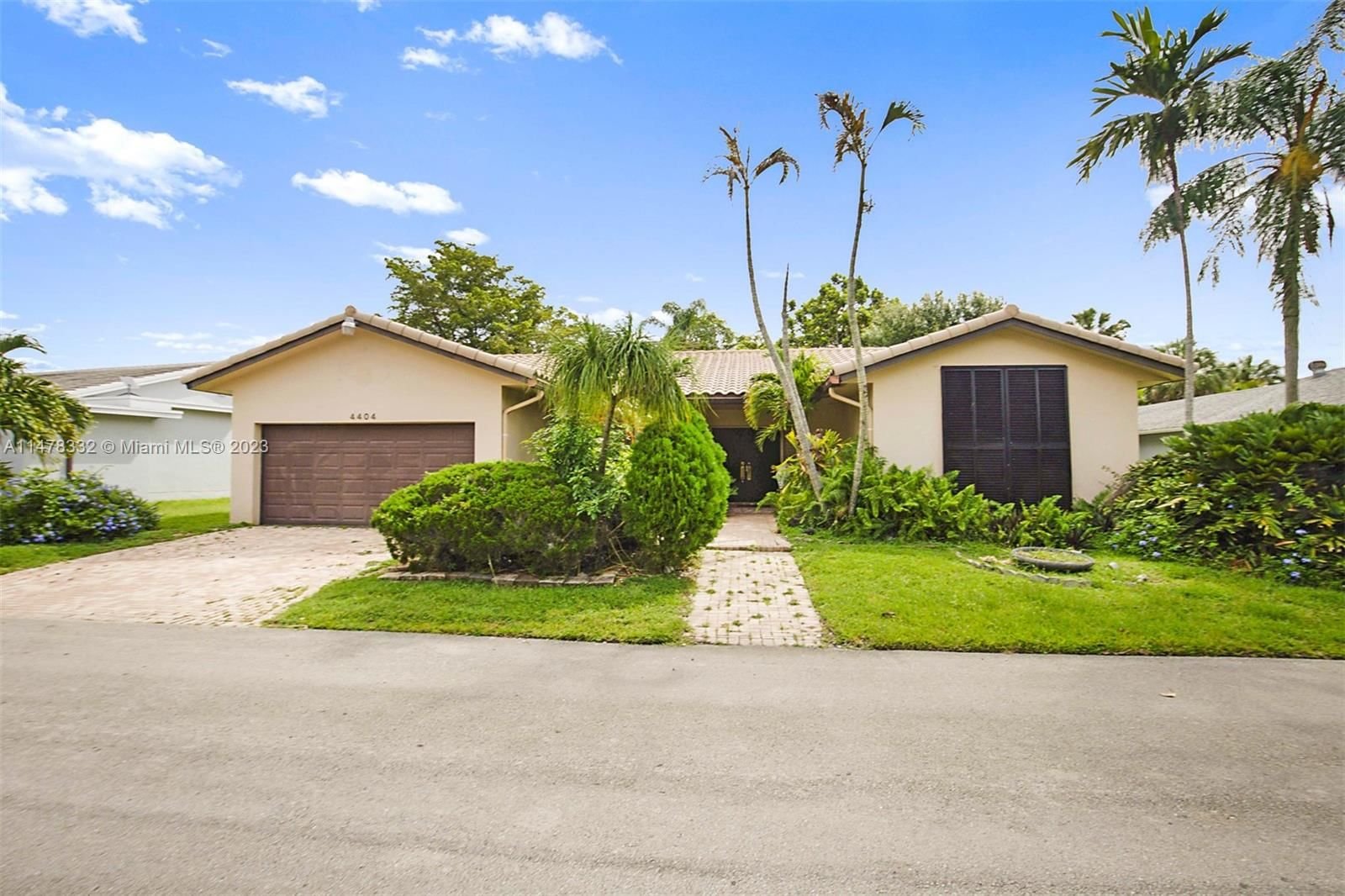 Real estate property located at 4404 Queen Palm Ln, Broward County, WOODLANDS SEC EIGHT, Tamarac, FL
