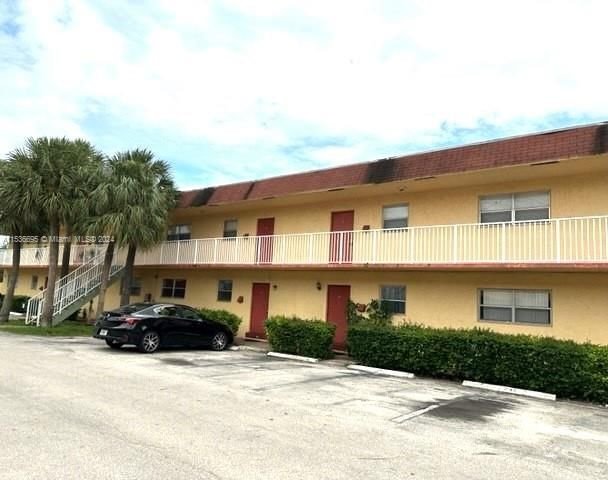Real estate property located at 850 Commercial Blvd #243E, Broward County, COURTYARDS AT CIMARRON CO, Oakland Park, FL