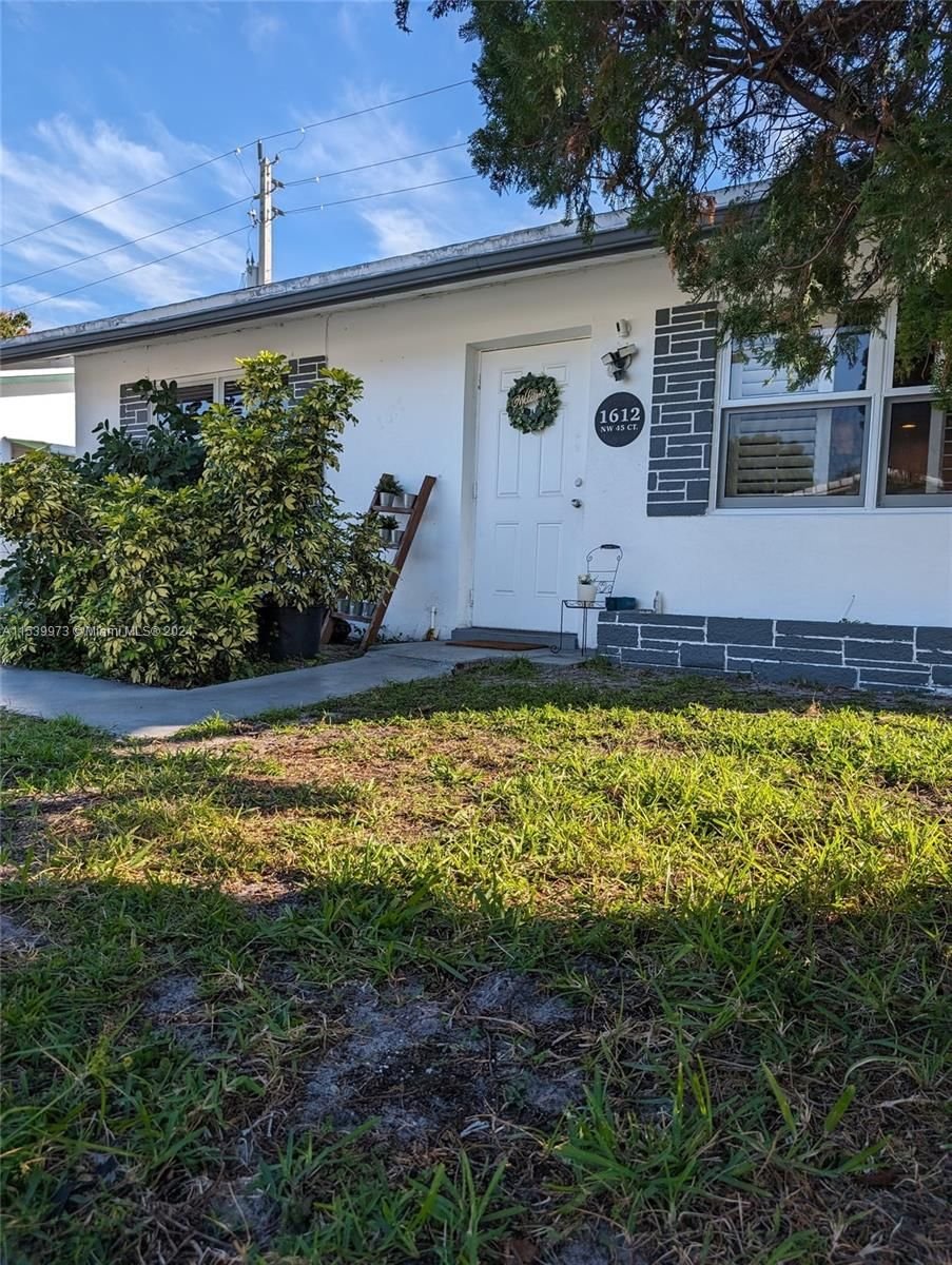 Real estate property located at 1612 45th Ct, Broward County, TAMARAC LAKES, Tamarac, FL