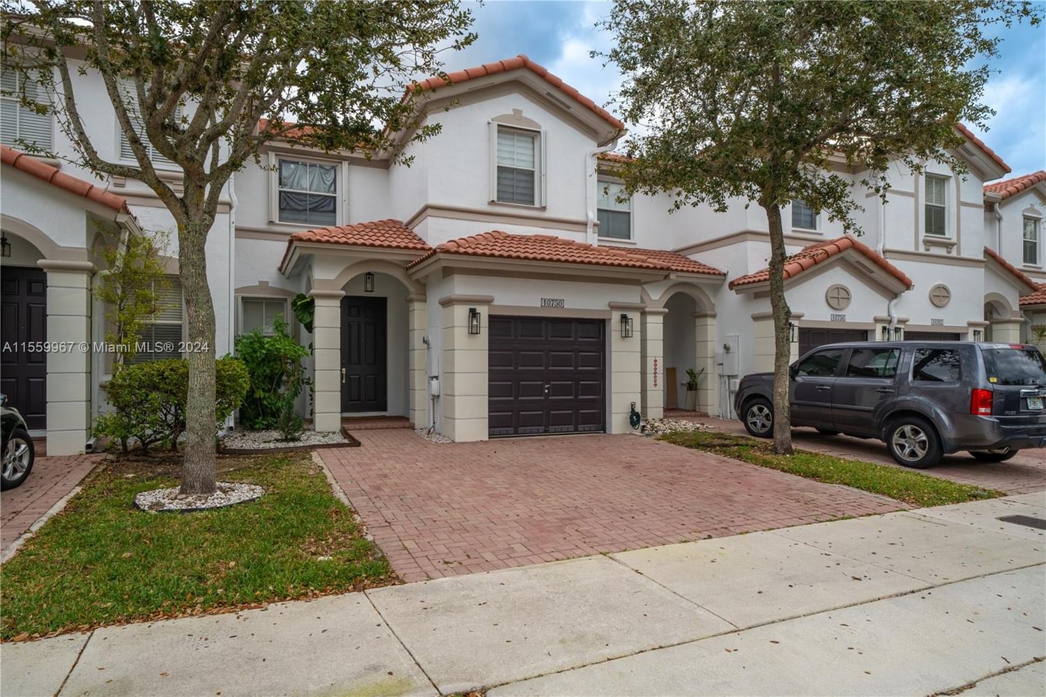 Real estate property located at 10750 80th Ln #10750, Miami-Dade County, ISLANDS AT DORAL 1ST ADDN, Doral, FL