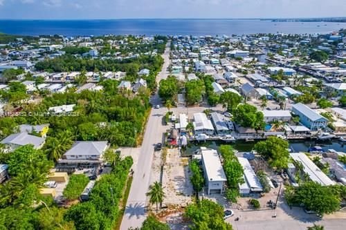 Real estate property located at 219 Pimilico Ln, Monroe County, CROSS KEY WATERWAYS EST S, Key Largo, FL