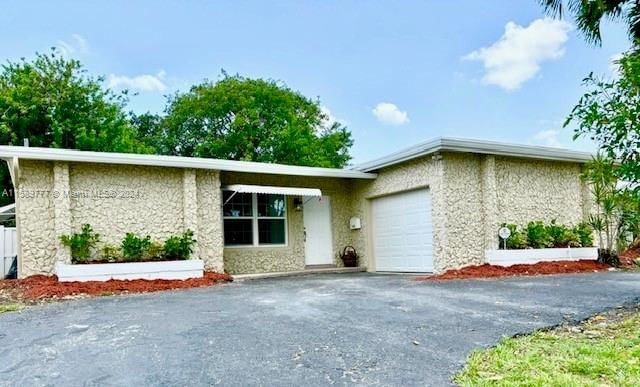 Real estate property located at 8590 24th Pl, Broward County, SUNRISE GOLF VILLAGE SEC, Sunrise, FL