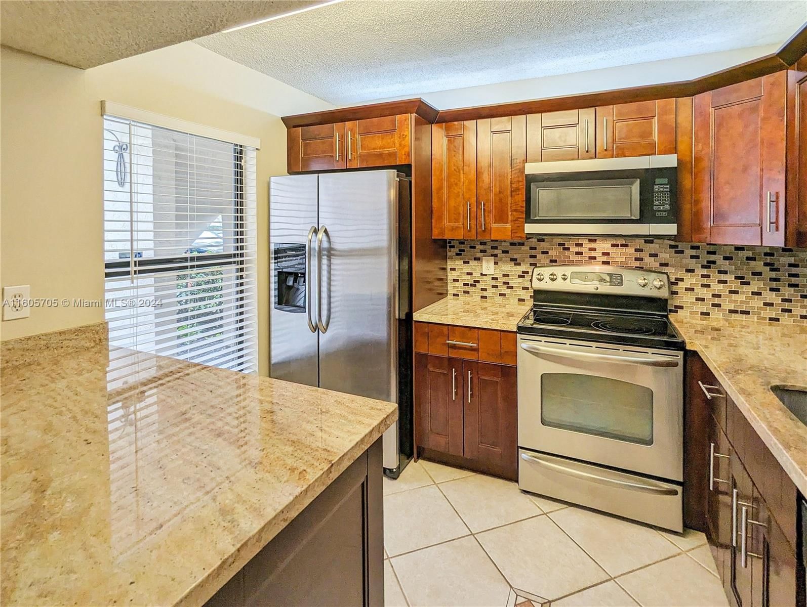 Real estate property located at 9811 3rd Ct #7, Broward County, QUATRAINE AT JACARANDA, Plantation, FL