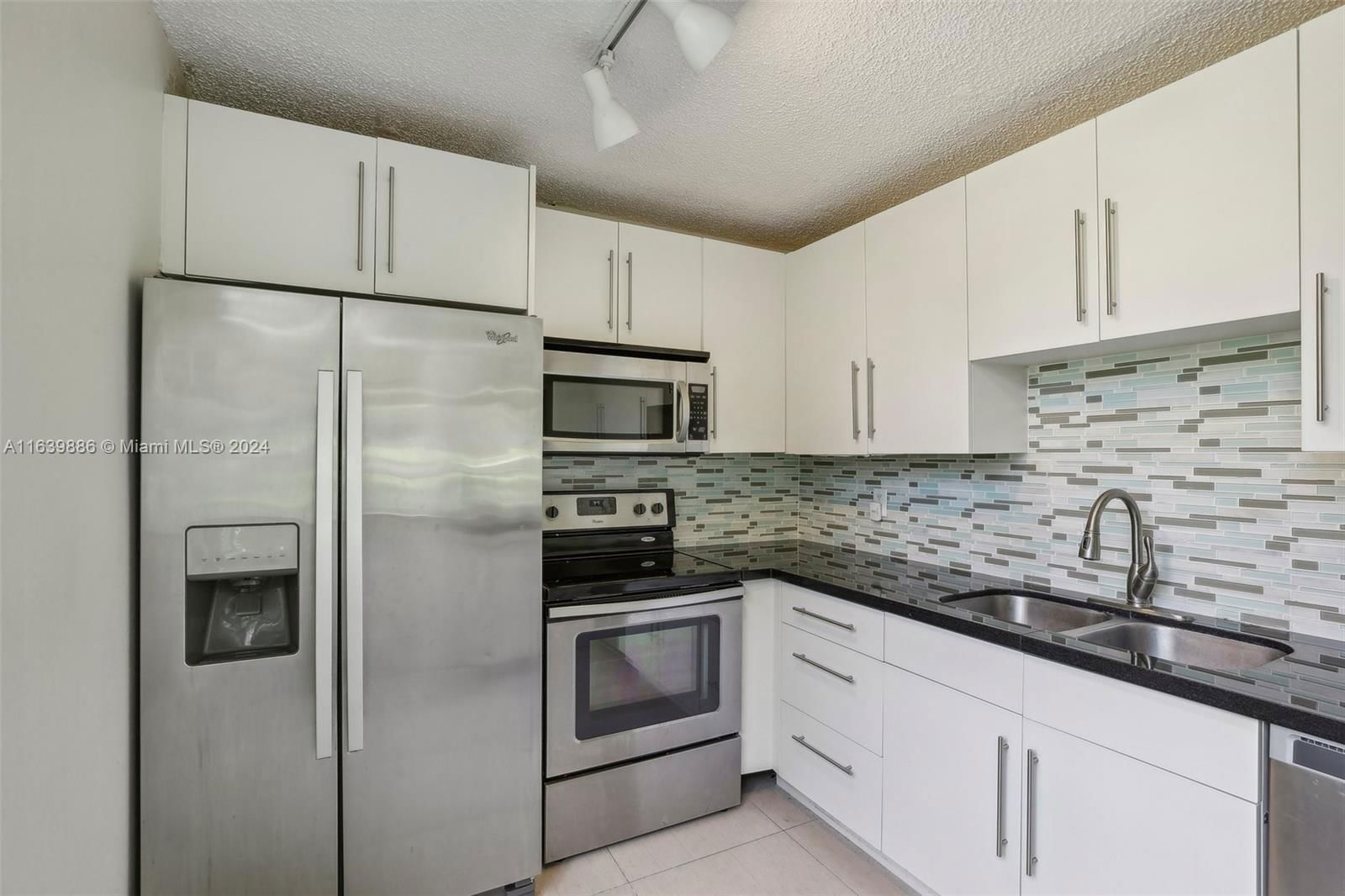 Real estate property located at 9471 Evergreen Pl #104, Broward, ORCHID TREE CONDO ONE, Davie, FL