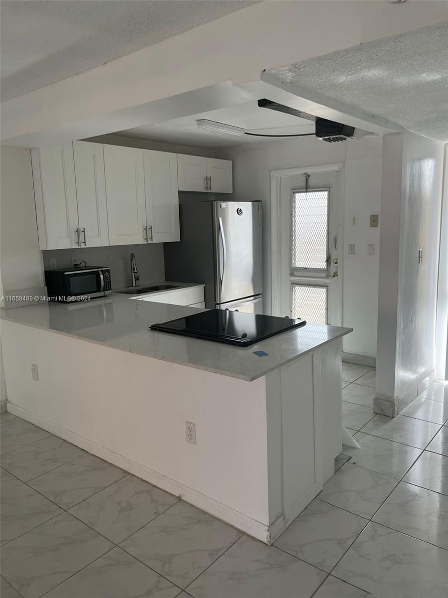 Real estate property located at 1850 169th St #311, Miami-Dade, CHANCELLOR HALL CONDO, North Miami Beach, FL