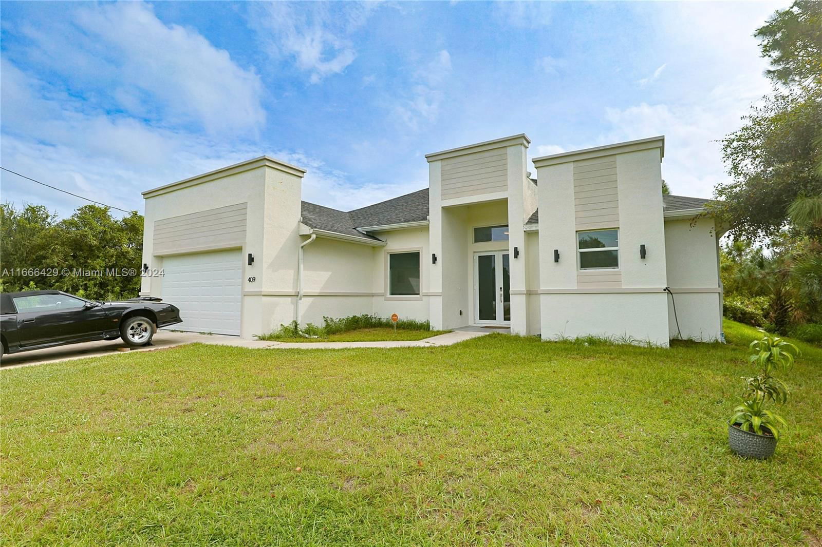 Real estate property located at 409 Columbus Blvd S, Lee, ISLAND OF HAPPINESS, Lehigh Acres, FL