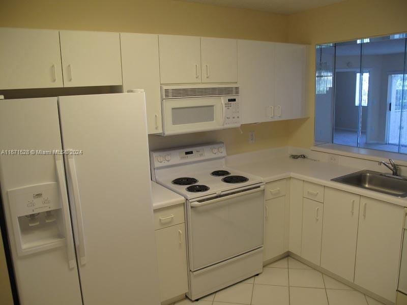 Real estate property located at 9511 Weldon Cir G402, Broward, WELDON CONDOMINIUM G, Tamarac, FL