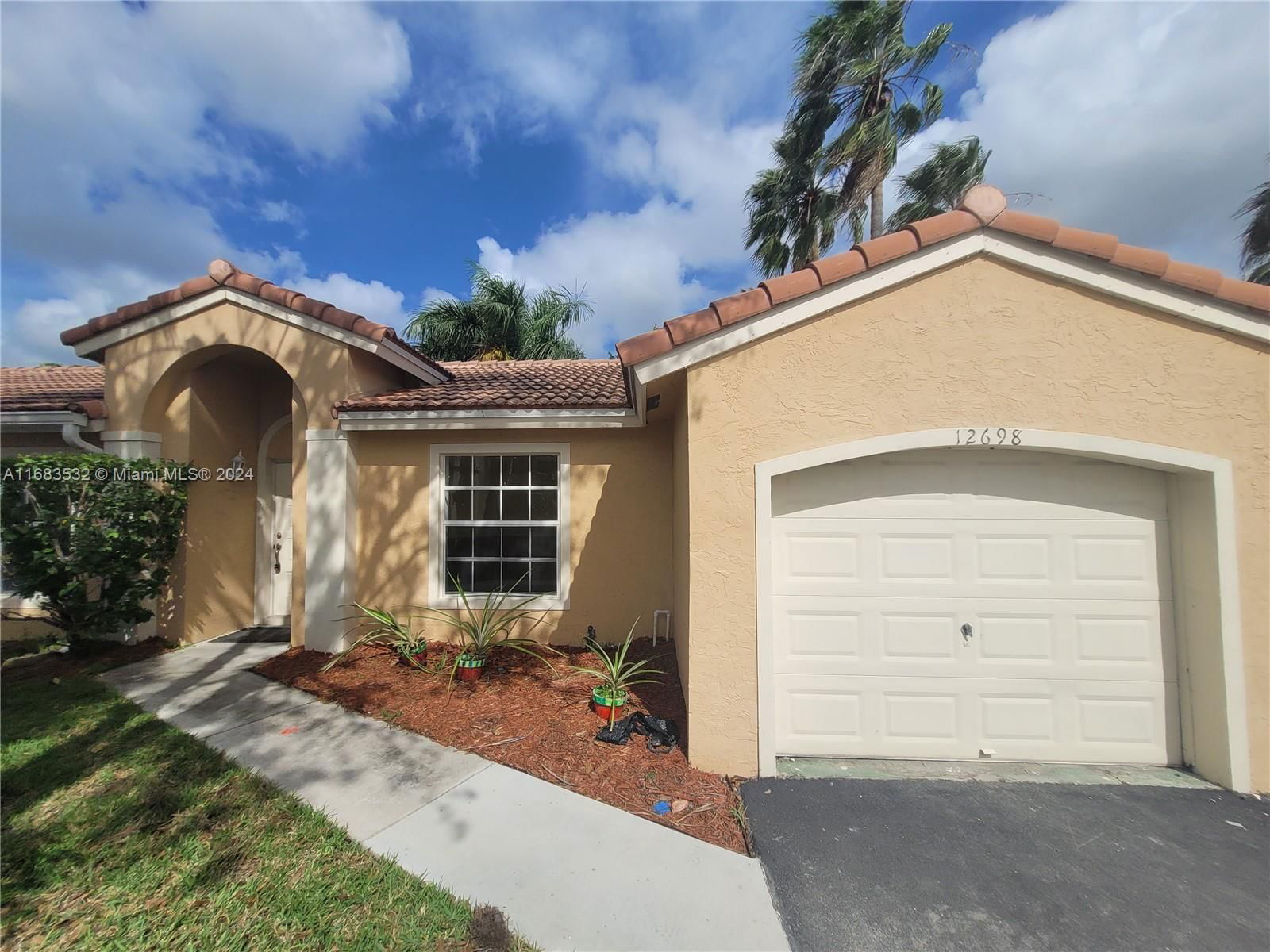 Real estate property located at 12698 15th St, Broward, Laguna At Savannah, Sunrise, FL