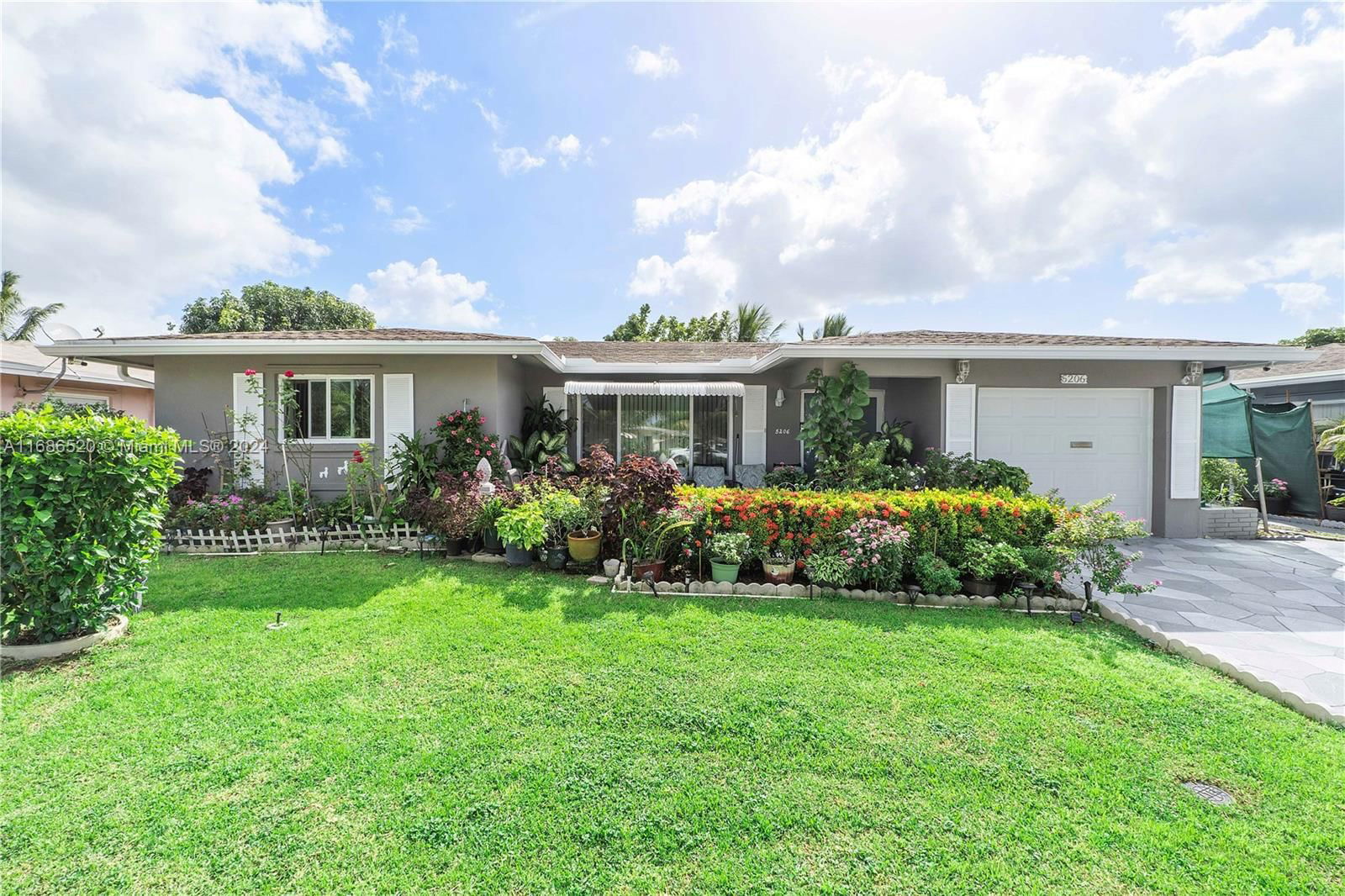 Real estate property located at 5206 49th Ave, Broward, MAINLANDS OF TAMARAC LAKE, Tamarac, FL