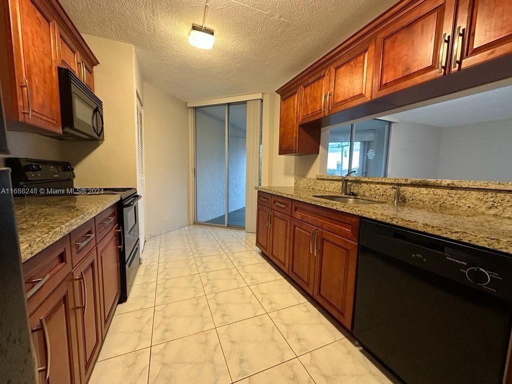 Real estate property located at 3100 Pine Island Rd #310, Broward, LE CHATEAU CONDO, Sunrise, FL