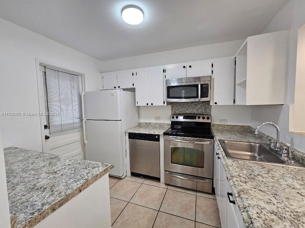 Real estate property located at 441 195th St #105, Miami-Dade, ROYAL OAKS CONDO, Miami, FL