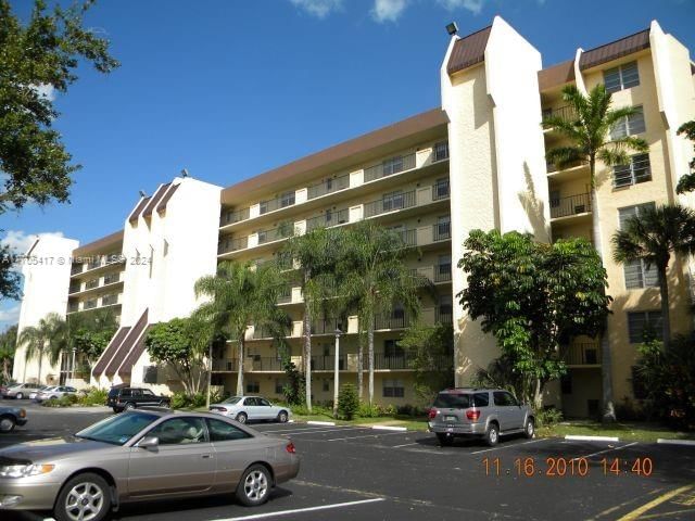 Real estate property located at 3100 Rolling Hills Cir #407, Broward, ROLLING HILLS GOLF AND TE, Davie, FL