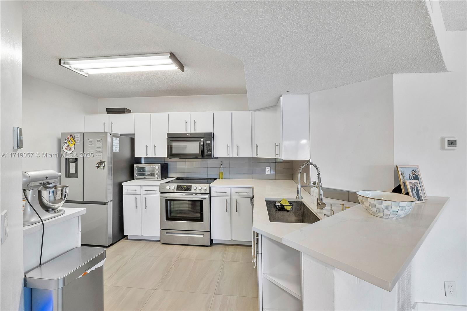 Real estate property located at 8871 Wiles Rd #204, Broward, Edgewater Condo, Coral Springs, FL