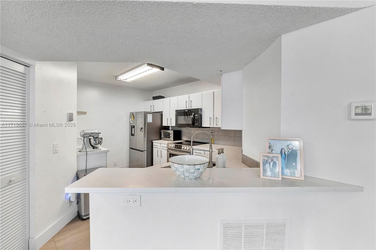 Real estate property located at 8871 Wiles Rd #204, Broward, Edgewater Condo, Coral Springs, FL