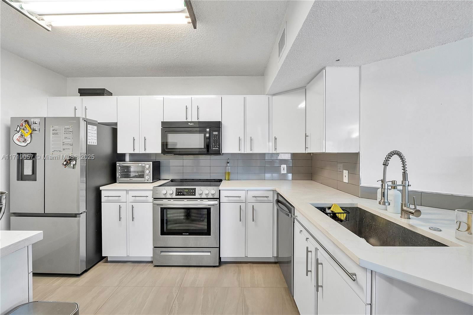 Real estate property located at 8871 Wiles Rd #204, Broward, Edgewater Condo, Coral Springs, FL