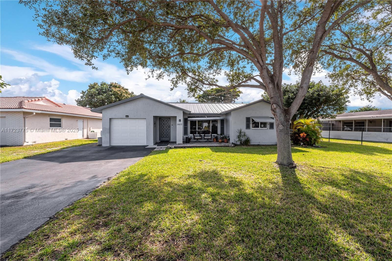 Real estate property located at 9410 74th Pl, Broward, Westwood Community 3, Tamarac, FL