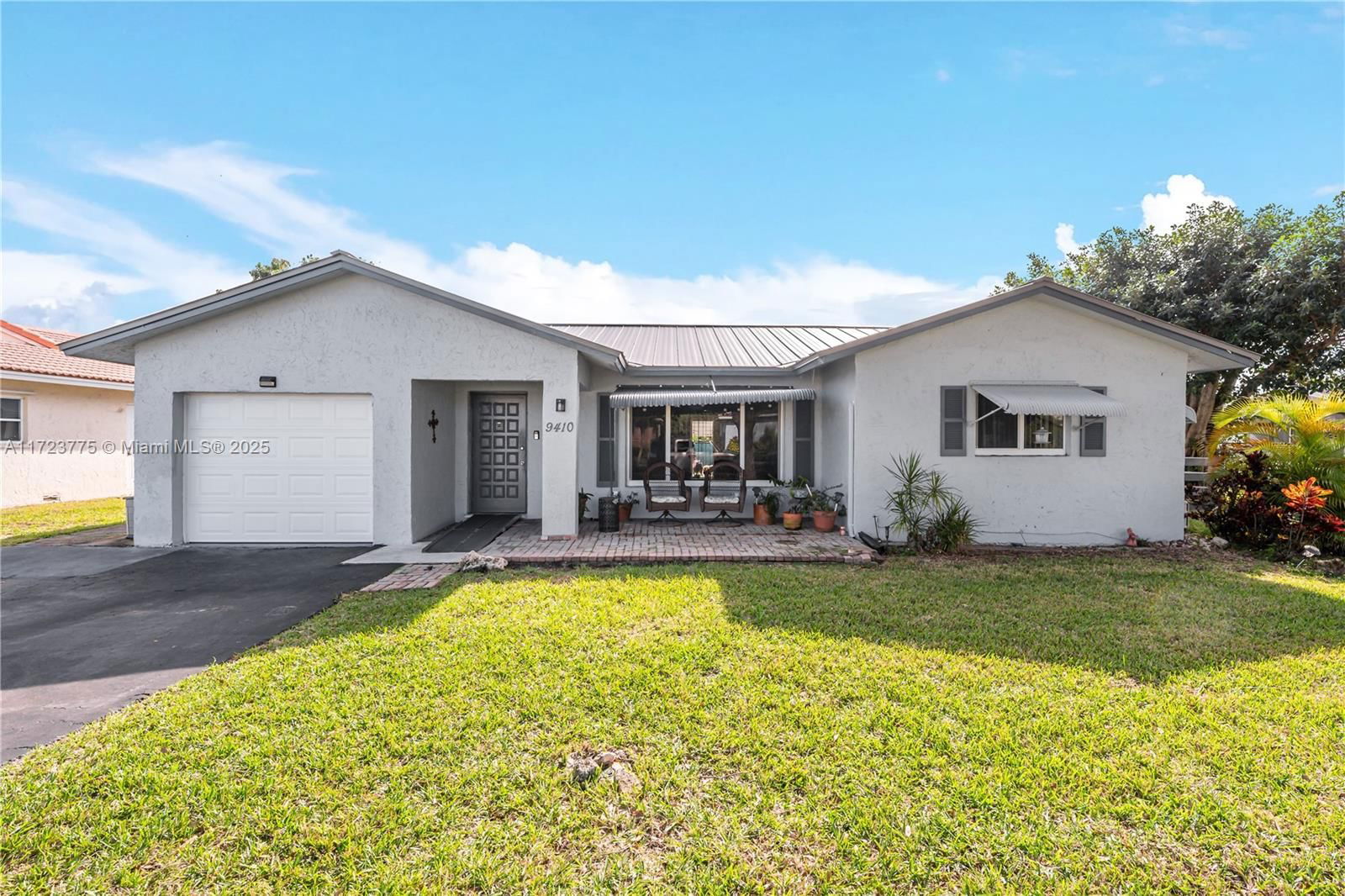 Real estate property located at 9410 74th Pl, Broward, Westwood Community 3, Tamarac, FL