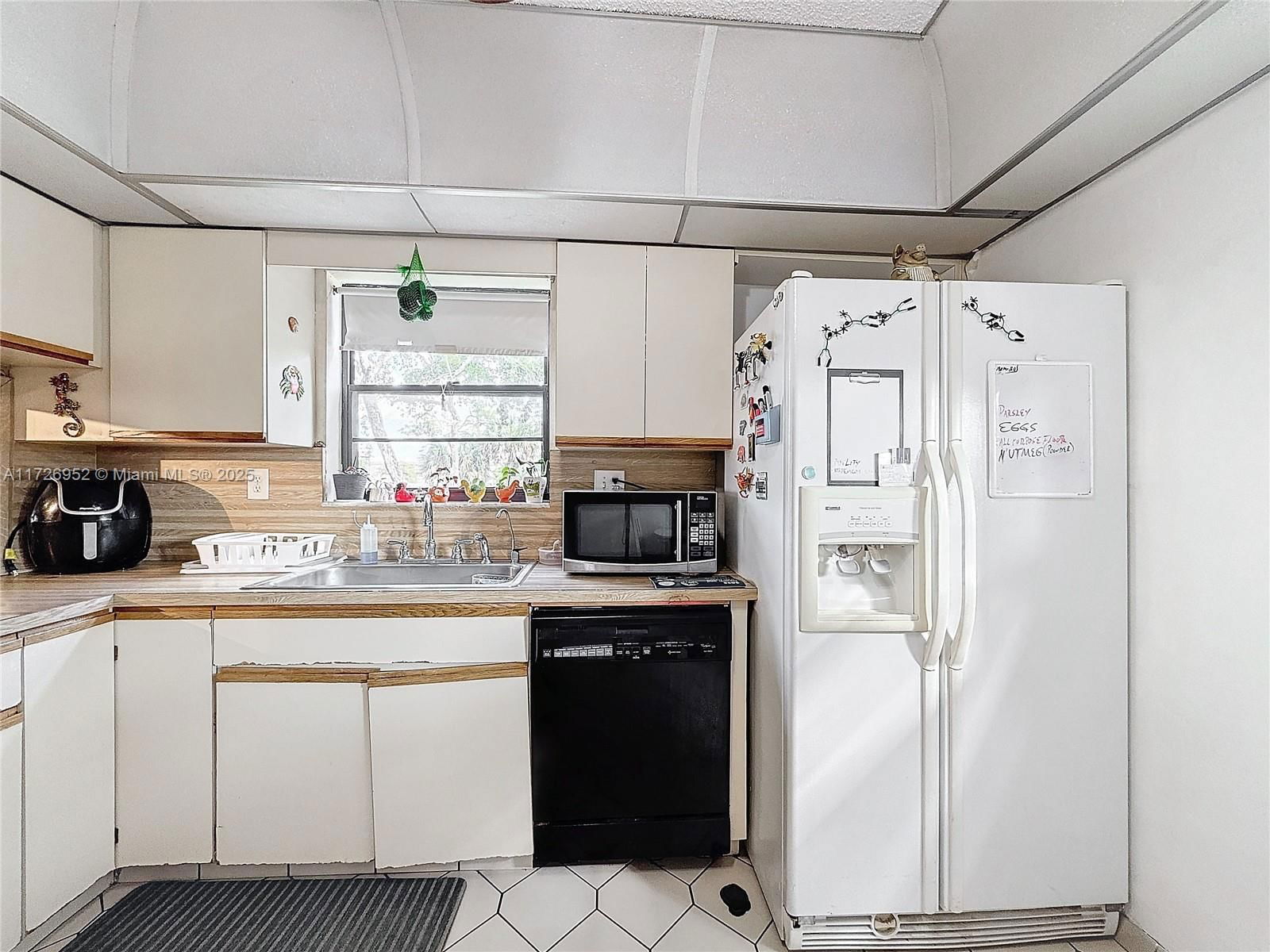 Real estate property located at 4975 Sabal Palm Blvd #214, Broward, Lakes Of Carriage Hills, Tamarac, FL