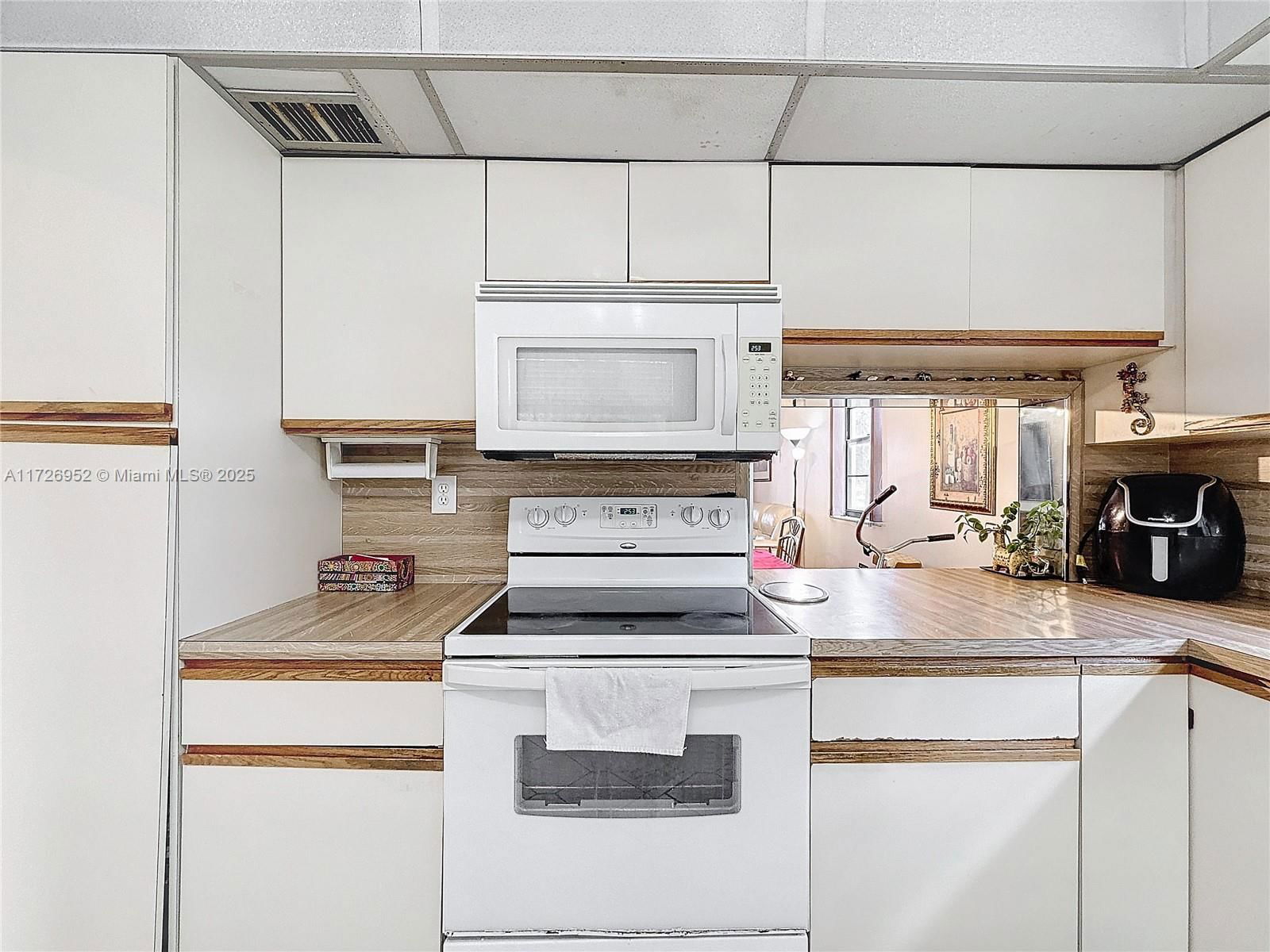 Real estate property located at 4975 Sabal Palm Blvd #214, Broward, Lakes Of Carriage Hills, Tamarac, FL