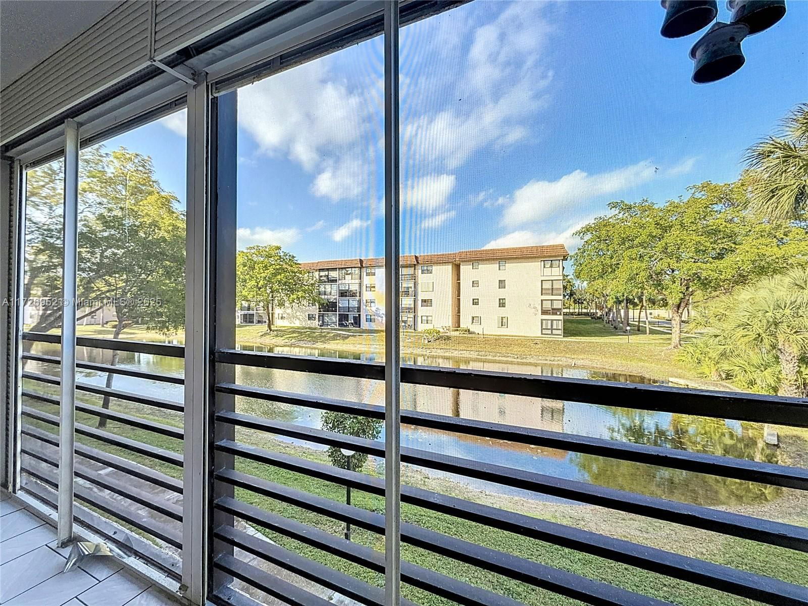 Real estate property located at 4975 Sabal Palm Blvd #214, Broward, Lakes Of Carriage Hills, Tamarac, FL