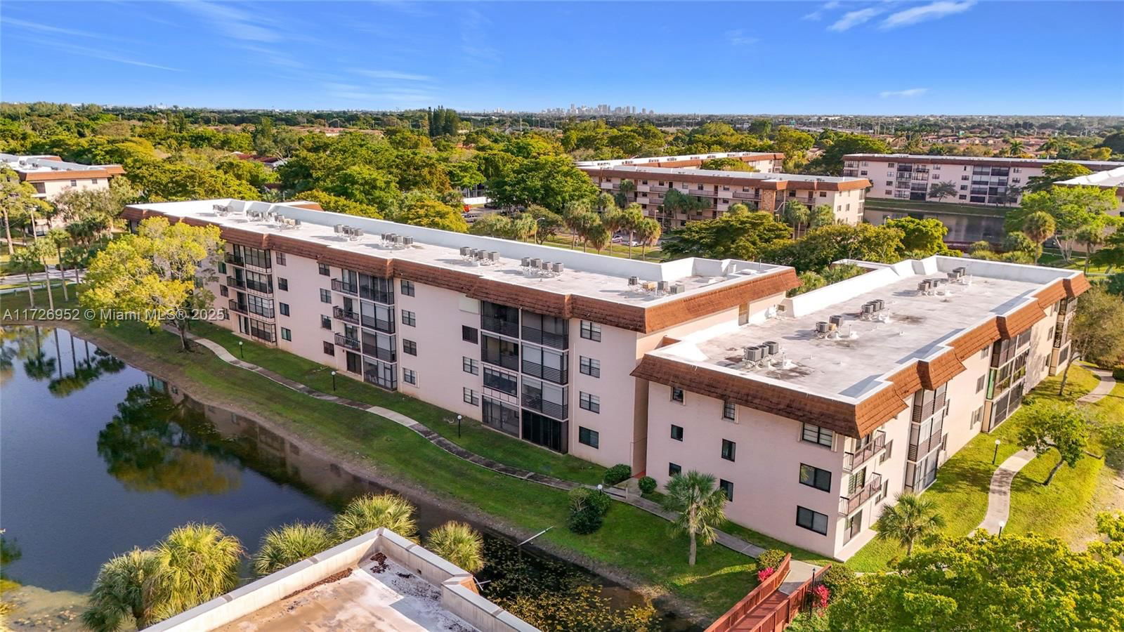 Real estate property located at 4975 Sabal Palm Blvd #214, Broward, Lakes Of Carriage Hills, Tamarac, FL