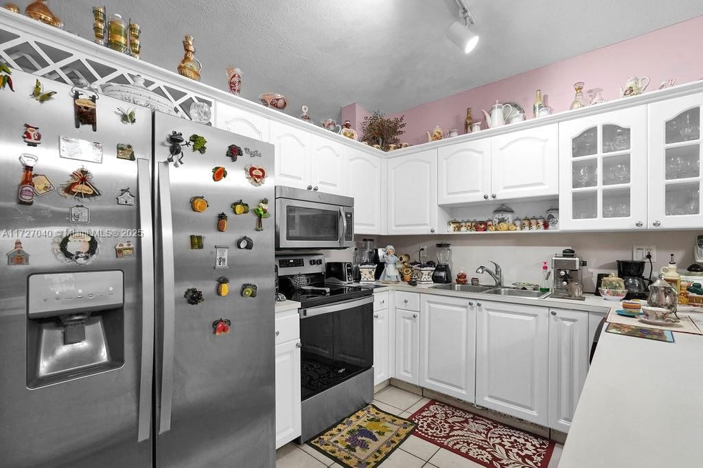 Real estate property located at 14199 9th St, Miami-dade, Vecin Homes 1st Addn, Miami, FL