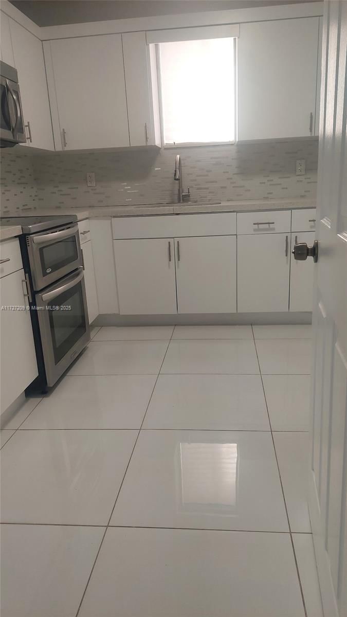 Real estate property located at 1545 73rd St, Miami-dade, Comm Liberty City 2nd Sec, Miami, FL