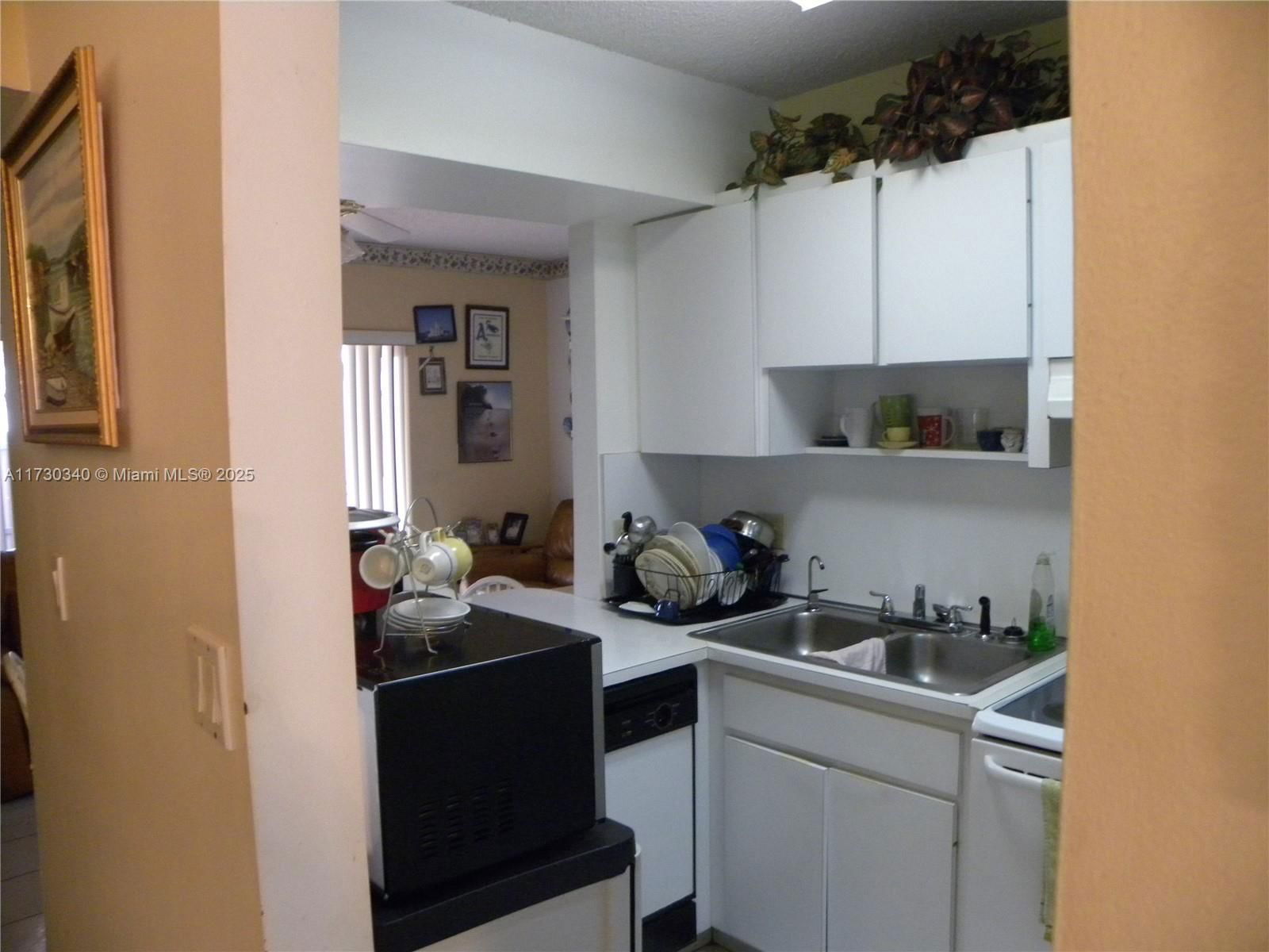Real estate property located at 4839 144th Ct, Miami-dade, Bird Lakes Townhouse Sec, Miami, FL