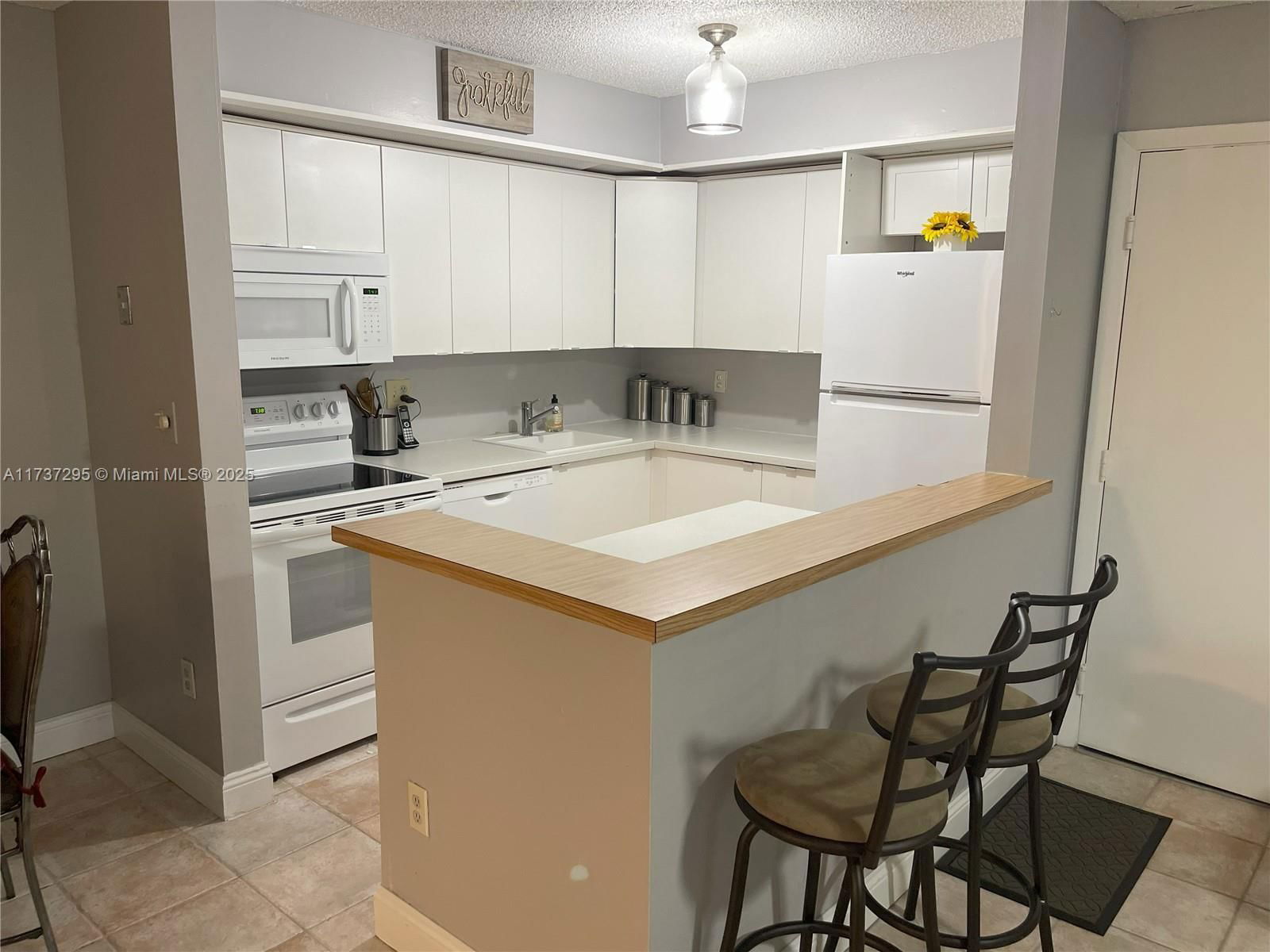 Real estate property located at 9668 Belfort Cir #101, Broward, Belfort Condominium I, Tamarac, FL