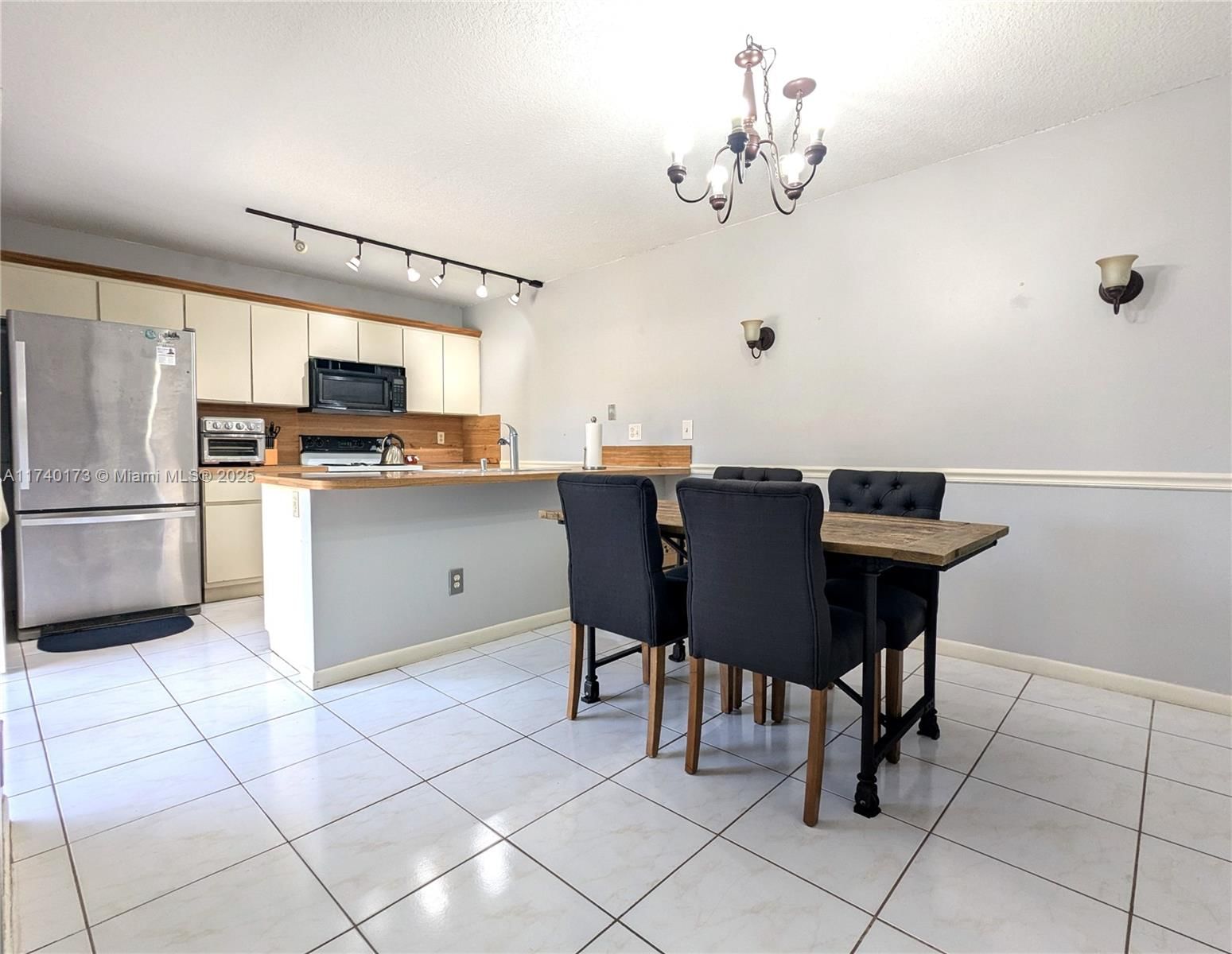 Real estate property located at 6030 55th Ln #6030, Broward, Woodland Lake Estates, Tamarac, FL