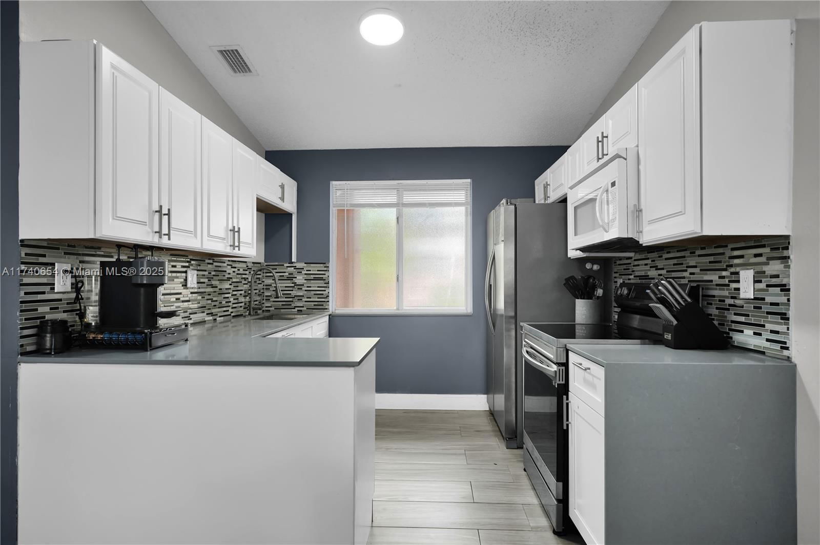 Real estate property located at 8013 Lake Dr #205, Miami-dade, Doral Court Condo, Doral, FL