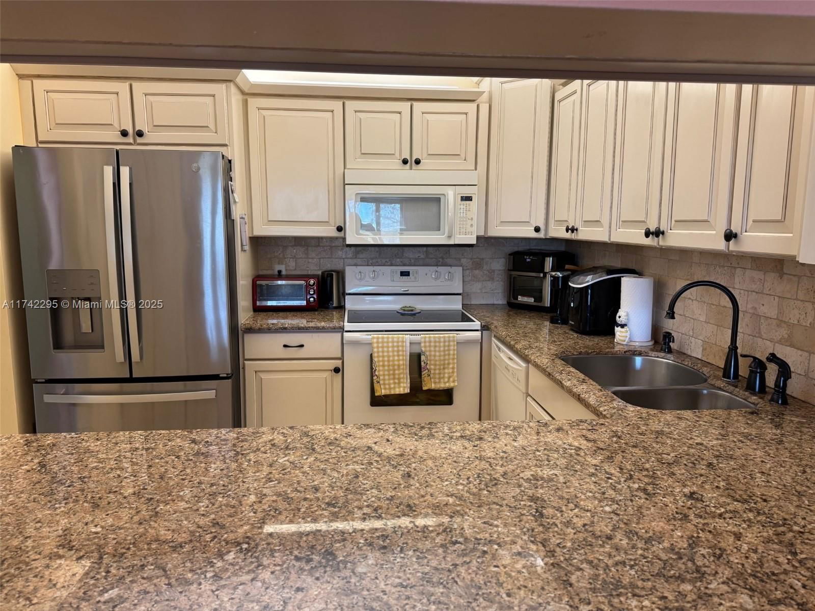 Real estate property located at 104 Freedom Ct #104, Broward, Freedom Square Condo, Deerfield Beach, FL