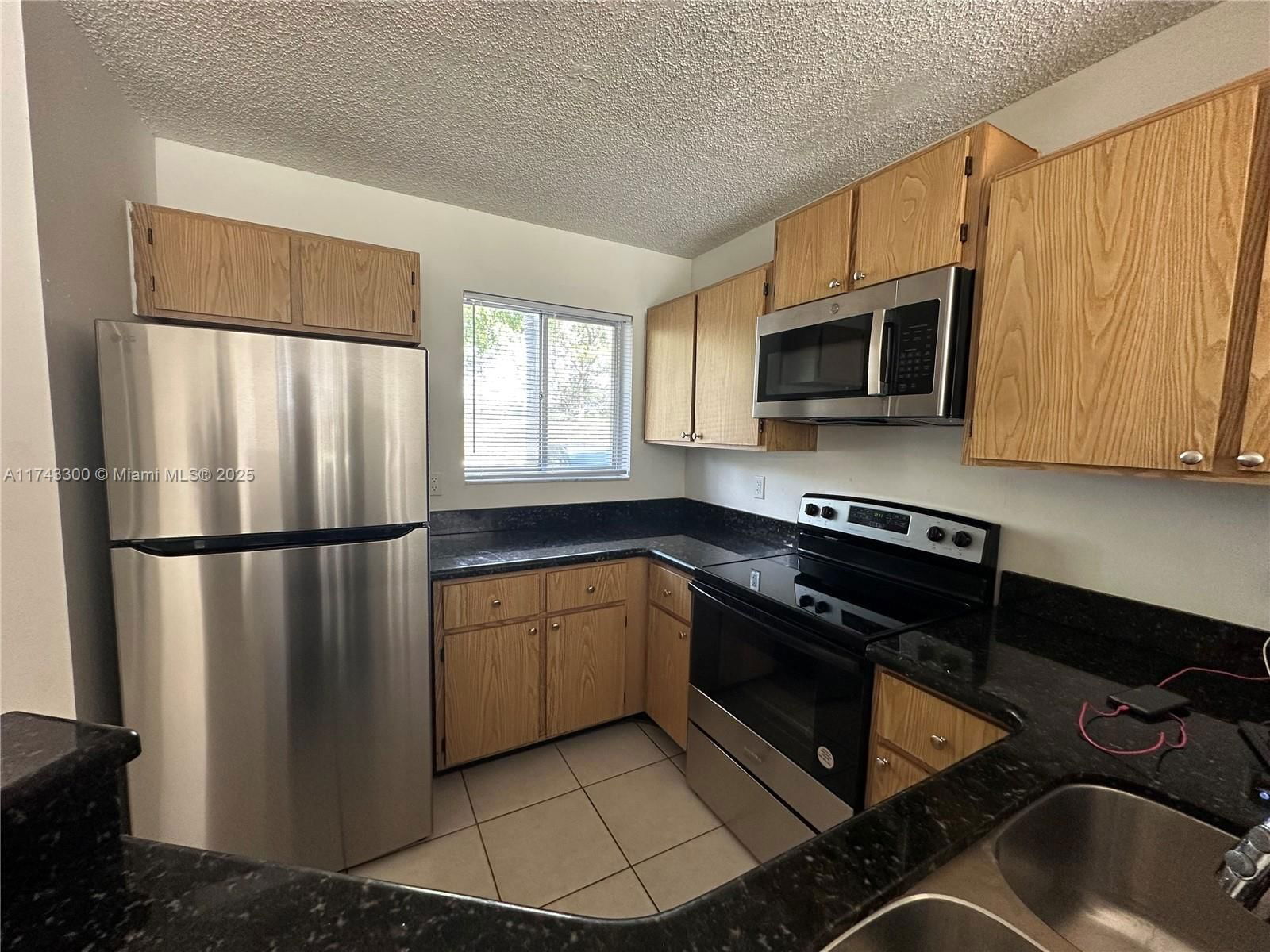 Real estate property located at 8750 Sherman Cir #102, Broward, Lakeshore At University P, Miramar, FL