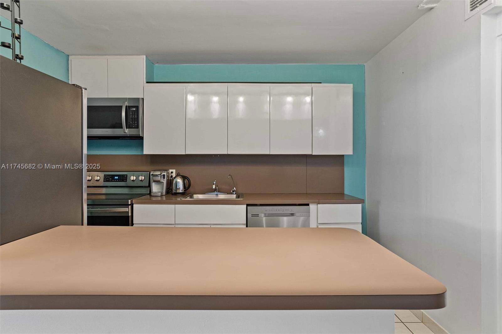 Real estate property located at 9273 Collins Ave #201, Miami-dade, Manatee Condo, Surfside, FL