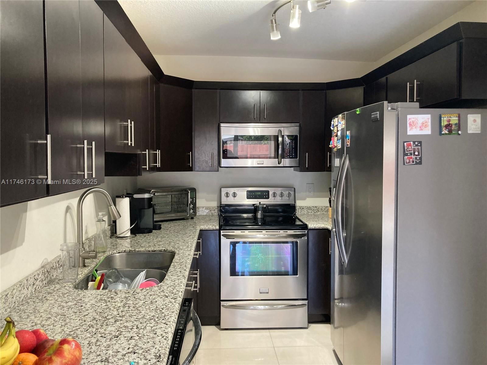 Real estate property located at 14473 50th Ln, Miami-dade, Bird Lakes Townhouse, Miami, FL