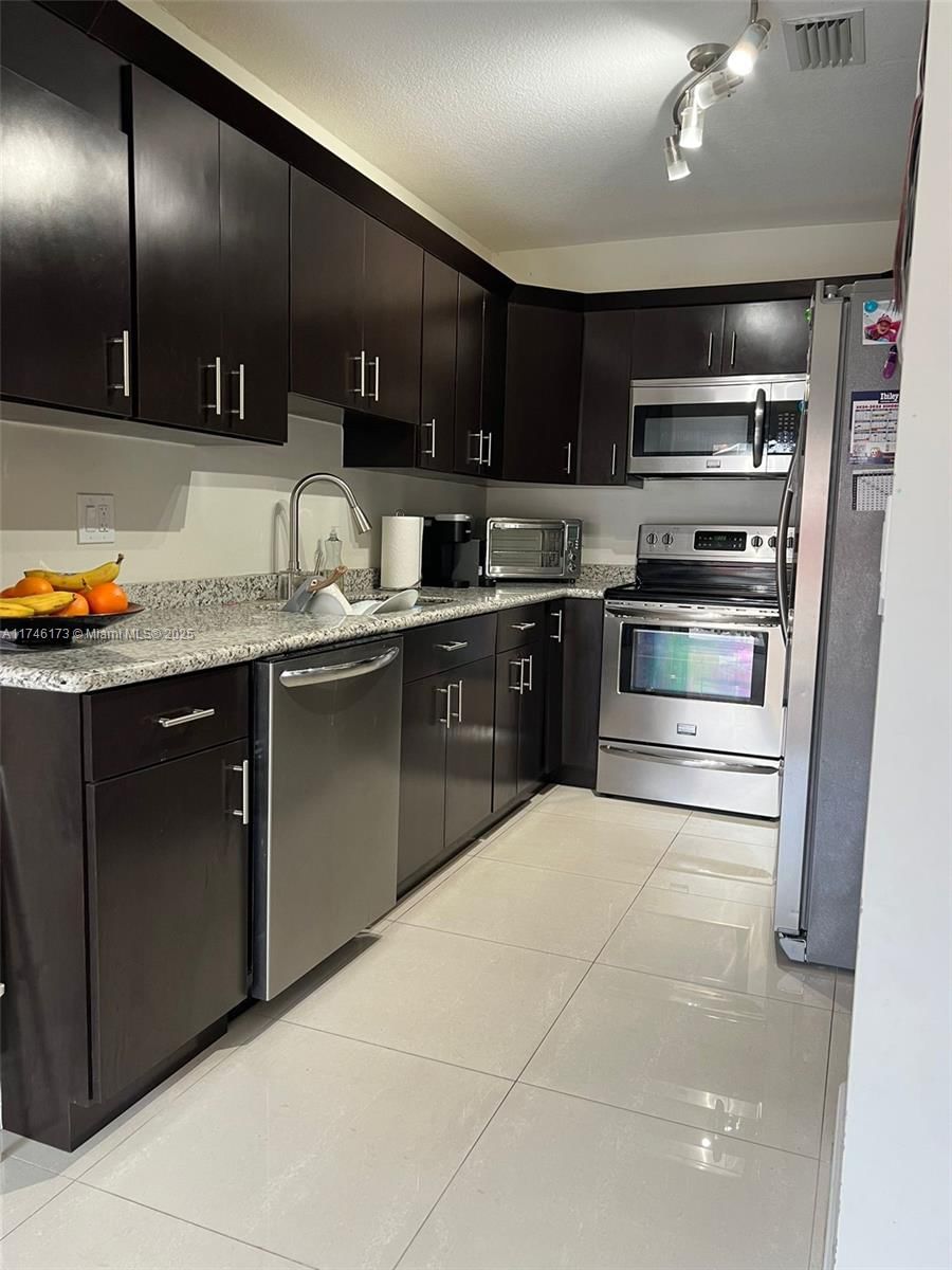 Real estate property located at 14473 50th Ln, Miami-dade, Bird Lakes Townhouse, Miami, FL