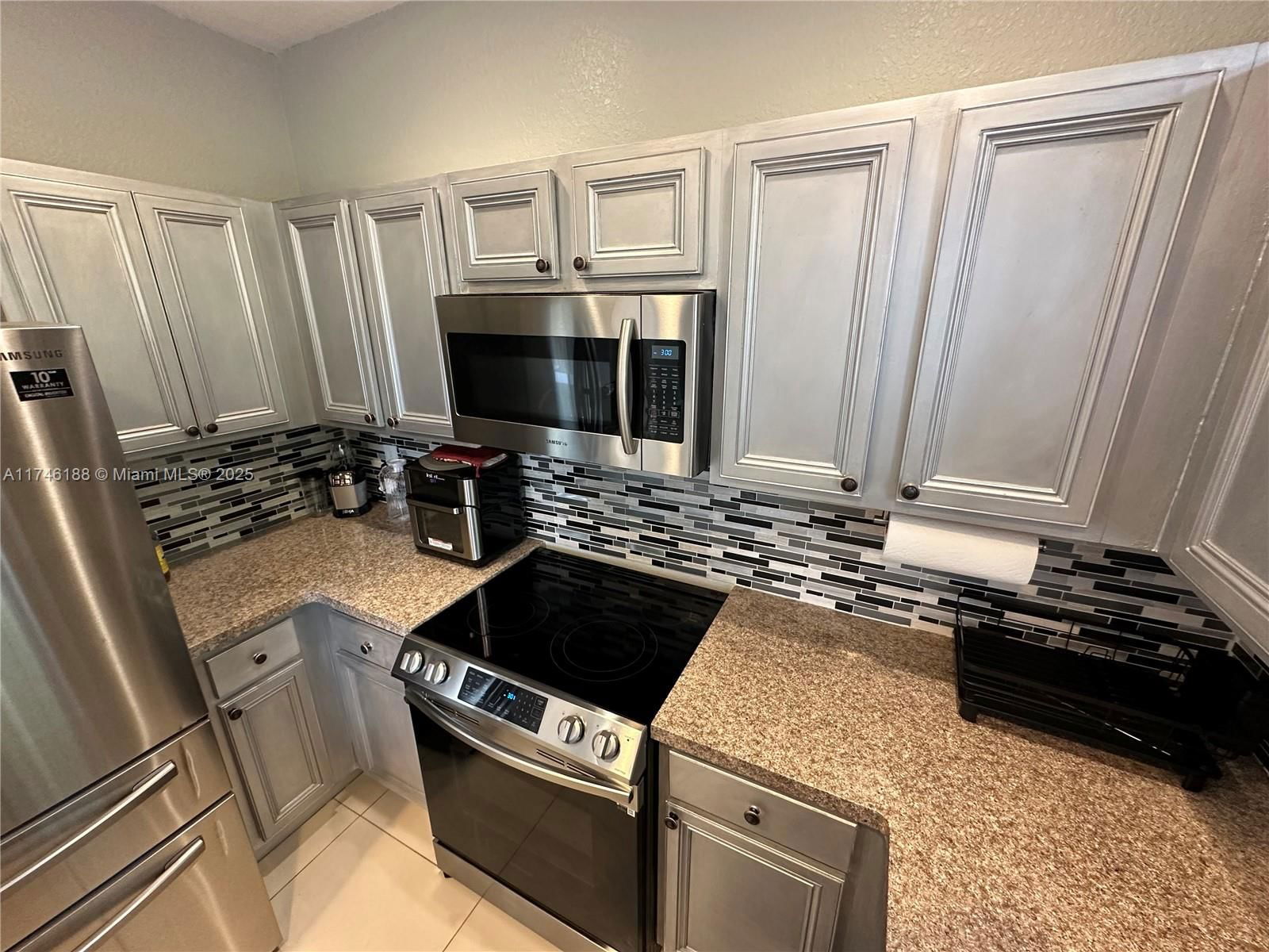 Real estate property located at 1023 208th St, Miami-dade, Ives Dairy Townhomes, Miami, FL