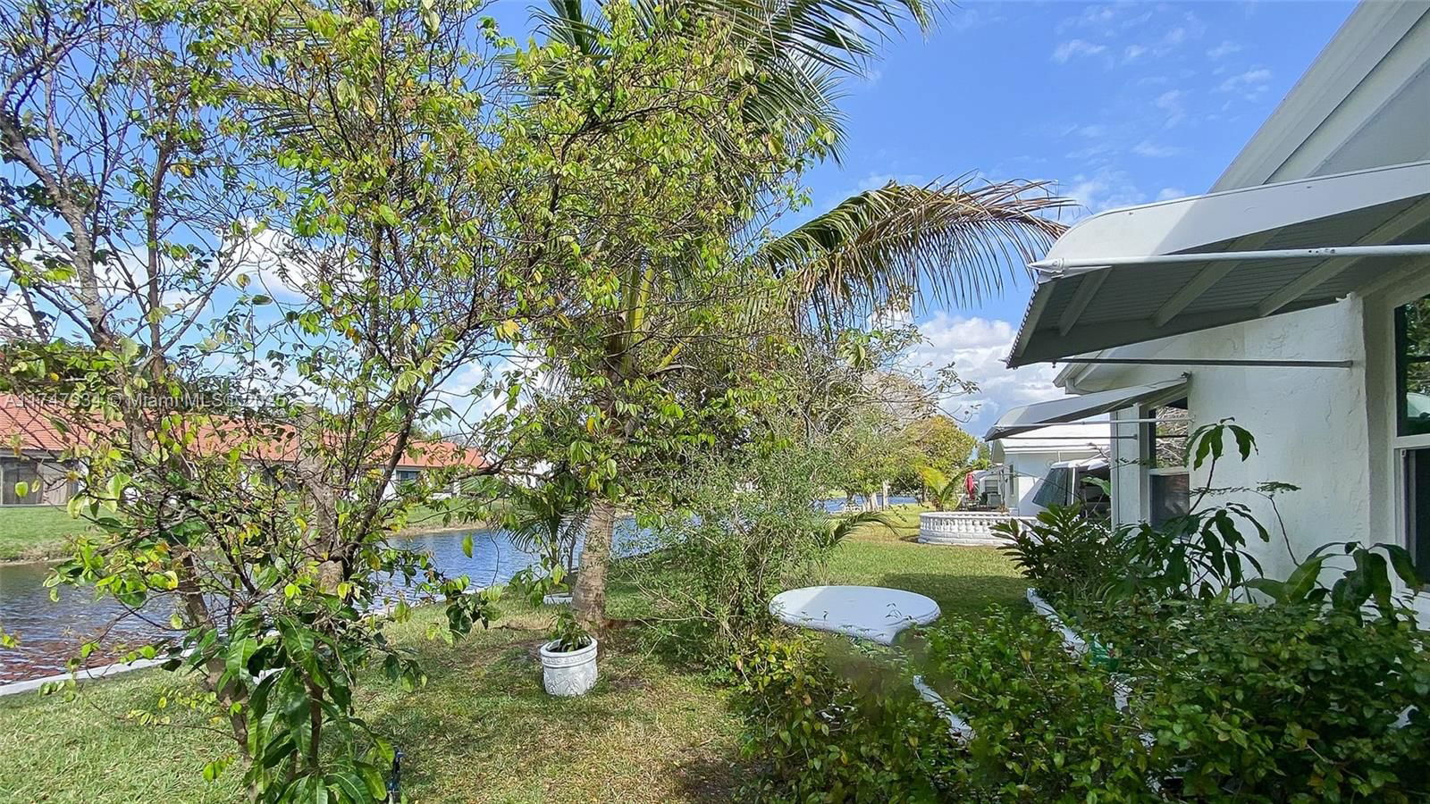 Real estate property located at 7105 73rd Ave, Broward, Mainlands Of Tamarac Lake, Margate, FL