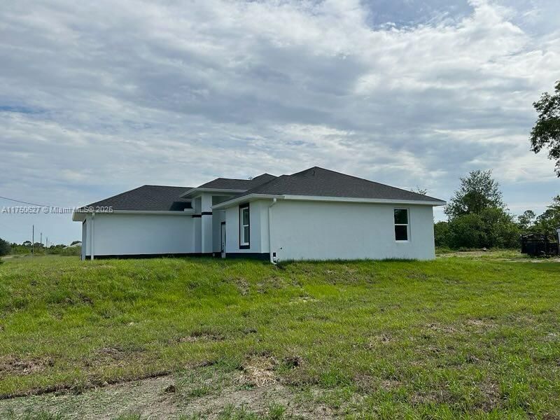 Real estate property located at 1412 FITCH AVE, Lee, Lee County Unincorporated, Lehigh Acres, FL