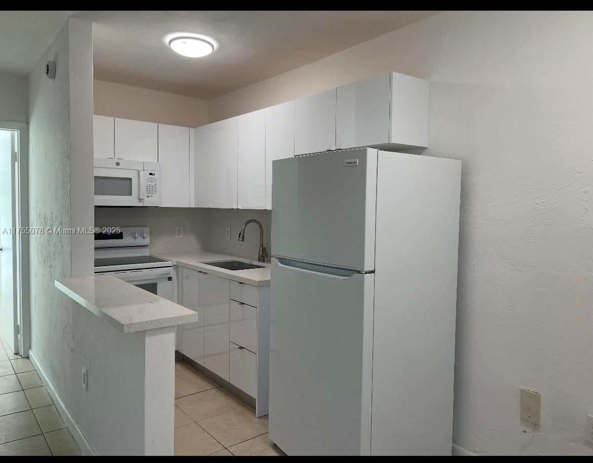 Real estate property located at 1860 Venice Park Dr #211, Miami-dade, Hidden Waters Condo, North Miami, FL