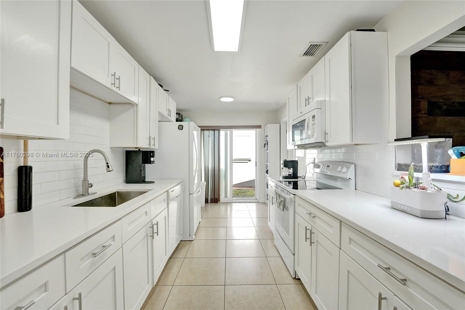 Real estate property located at 6003 68th Ter, Broward, Mainlands Of Tamarac Lake, Tamarac, FL