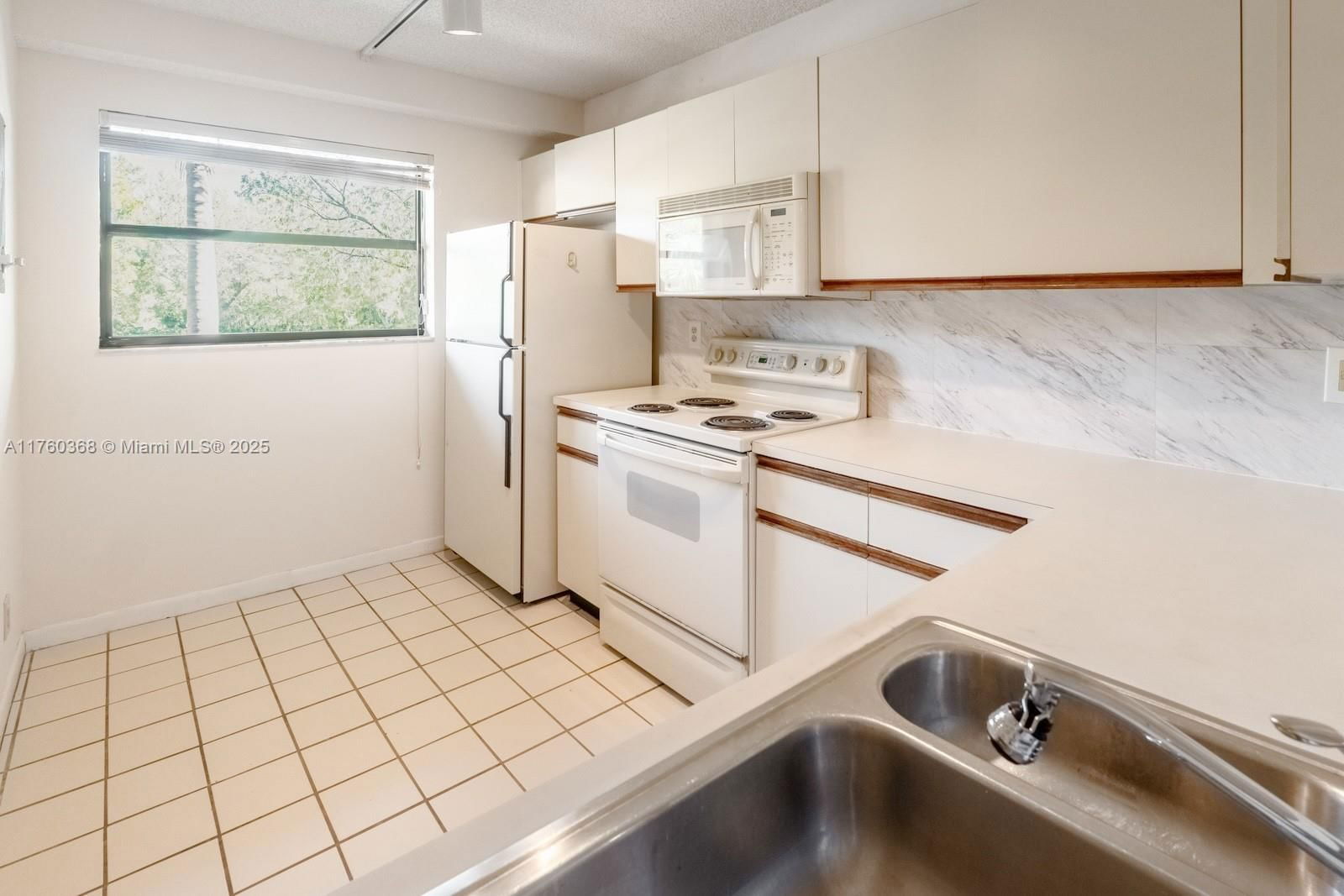 Real estate property located at 7737 79th Ave #205, Broward, Bonaire At Woodmont No 1-, Tamarac, FL