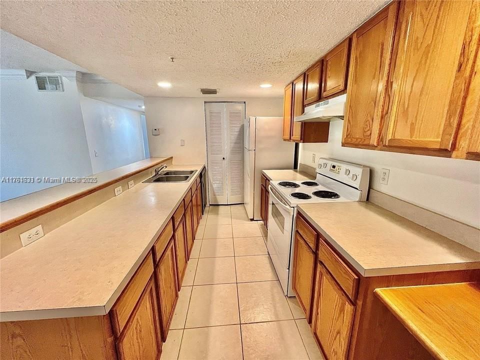 Real estate property located at 9905 Westwood Dr #12-3, Broward, Nob Hill Landings Condomi, Tamarac, FL