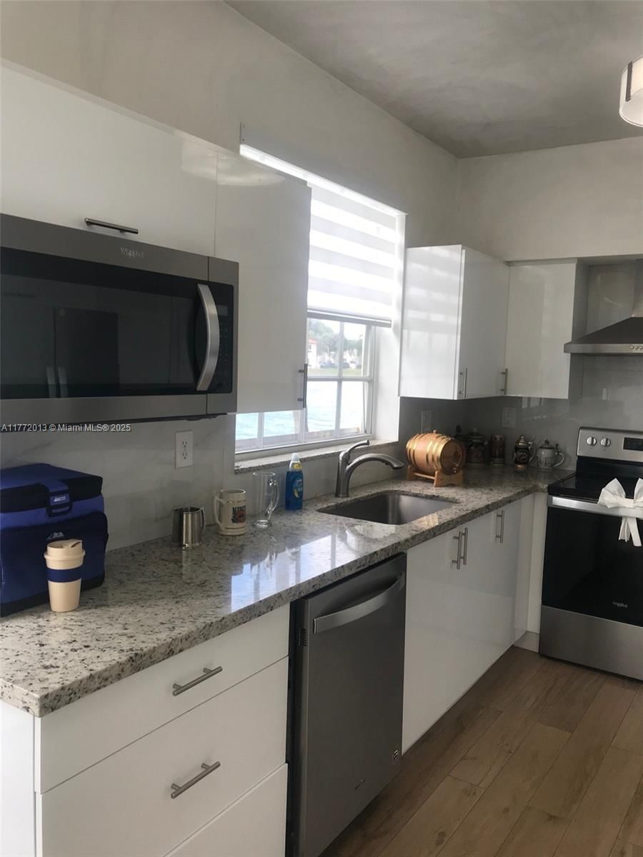 Real estate property located at 14621 Balgowan Rd #102-3, Miami-dade, Regatta Pointe Condo No T, Miami Lakes, FL