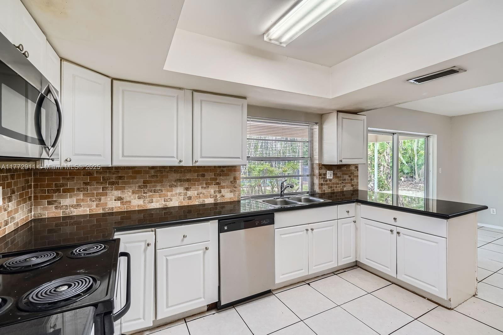 Real estate property located at 7301 11th St, Broward, Mirror Lake Estates Sec T, Plantation, FL