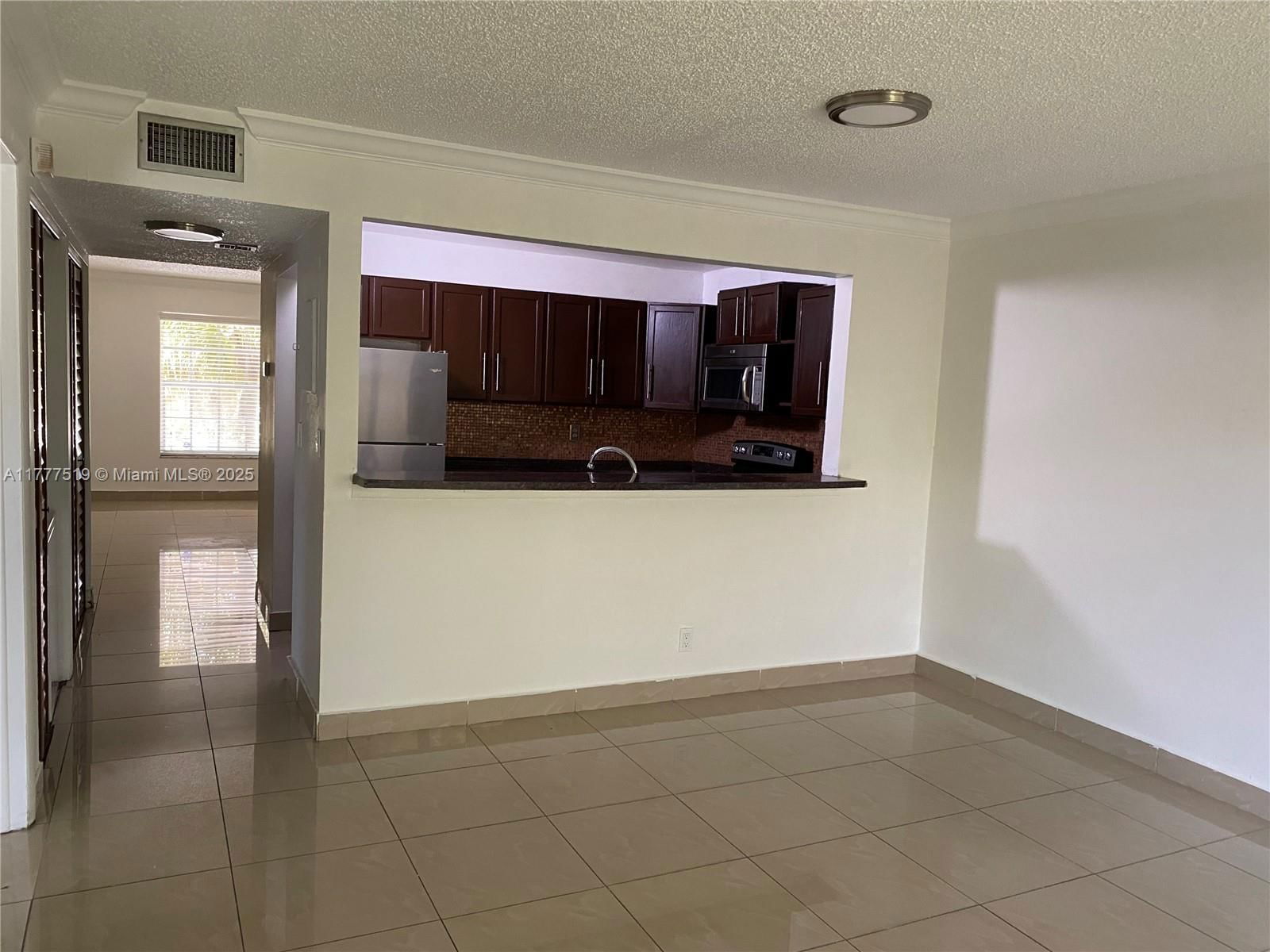 Real estate property located at 4210 21st St #102, Broward, Wood Hue Ii Condo, Lauderhill, FL