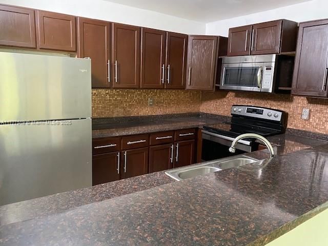 Real estate property located at 4210 21st St #102, Broward, Wood Hue Ii Condo, Lauderhill, FL