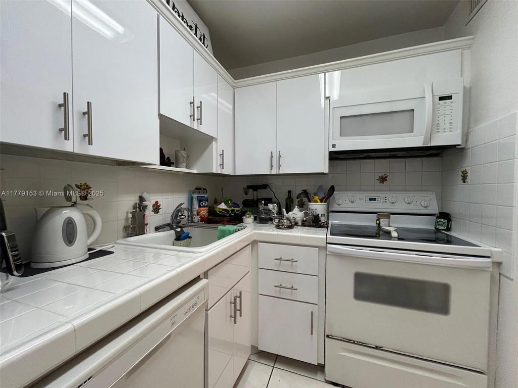 Real estate property located at 2899 Collins Ave #1233, Miami-dade, Triton Tower Condo, Miami Beach, FL